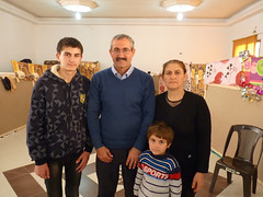 Dr_Imad_Ibraheem_Daood_with_his_wife_Sajida_and_their_four_children_Iraqi_Christian_refugees_at_a_church_in_Amman_Jordan_Catholic_News_Agency_Credit